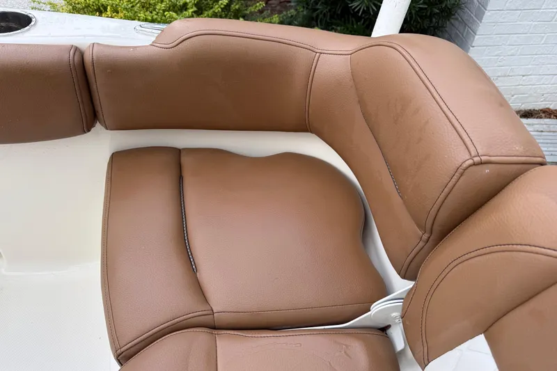 Slide: The Image of Brown leather seating on 2021 Pioneer 202 Islander boat. - 23