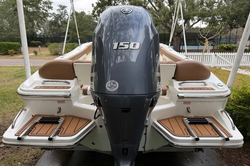 Slide: The Image of 2021 Pioneer 202 Islander boat with Yamaha 150 outboard motor, rear view. - 5