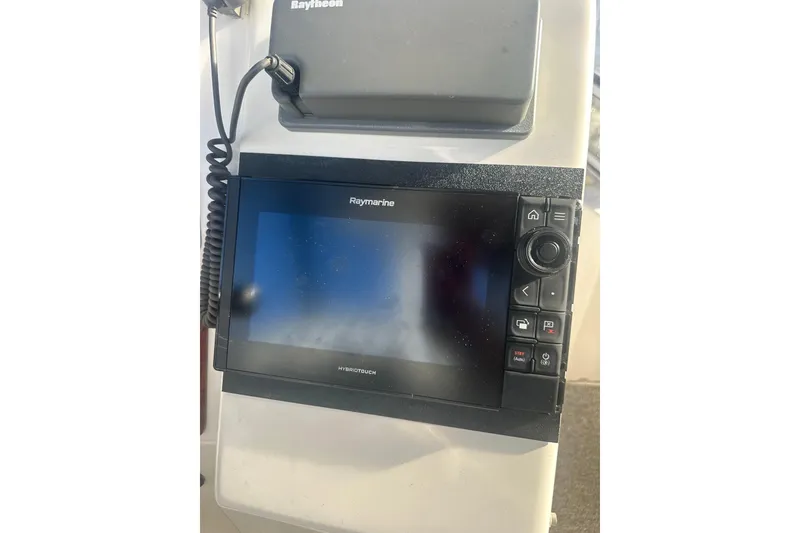 Slide: The Image of Raymarine HybridTouch display on 2000 Silverton 38 boat dashboard. - 6