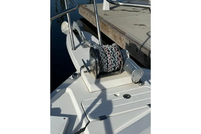 Slide: The Image of Anchor winch on 2020 Parker 2320 Sport Cabin boat at dockside. - 13