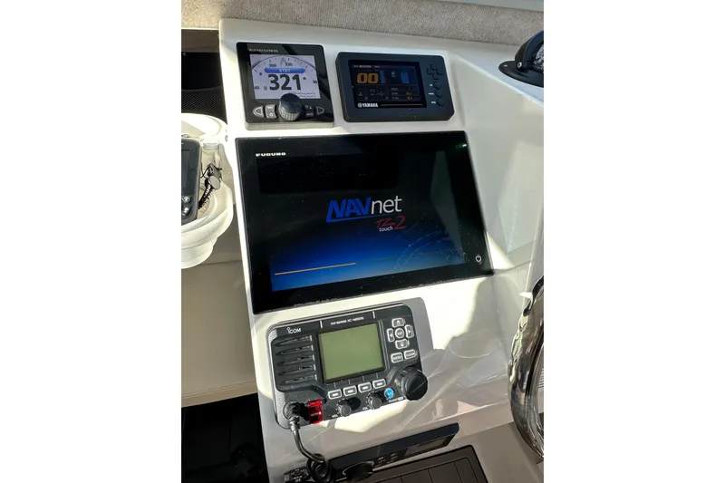 Slide: The Image of Control panel of 2020 Parker 2320 Sport Cabin with navigation and communication systems. - 21