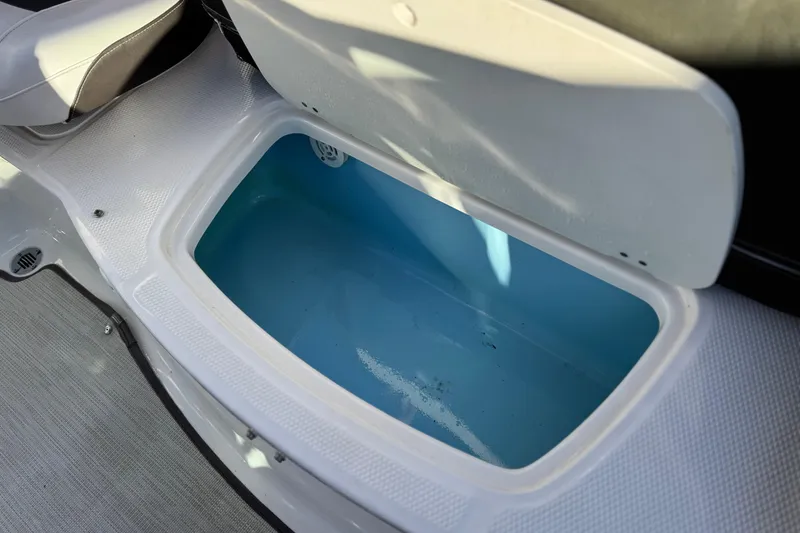 Slide: The Image of Open storage compartment in 2019 Chaparral 21 H2O Ski & Fish boat. - 20