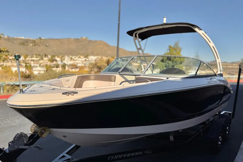 Slide: The Image of 2019 Chaparral 21 H2O Ski & Fish boat on trailer, scenic background. - 3