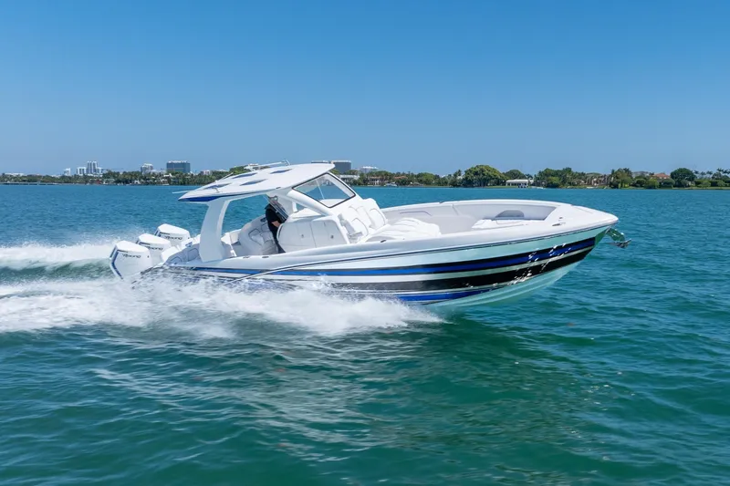 Slide: The Image of 2026 Deep Impact 369 Sport boat on the water. - 10