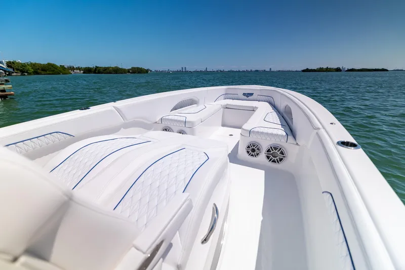 Slide: The Image of Luxurious 2026 Deep Impact 369 Sport boat on open water. - 14