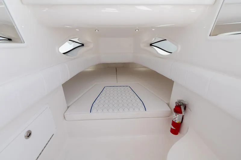 Slide: The Image of Interior of Deep Impact 369 Sport 2026 with white upholstery. - 25