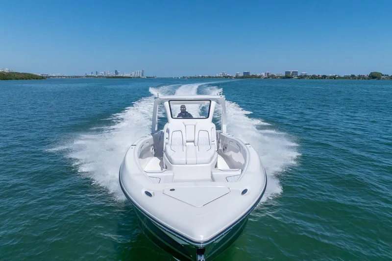 Slide: The Image of 2026 Deep Impact 369 Sport boat on open water. - 30