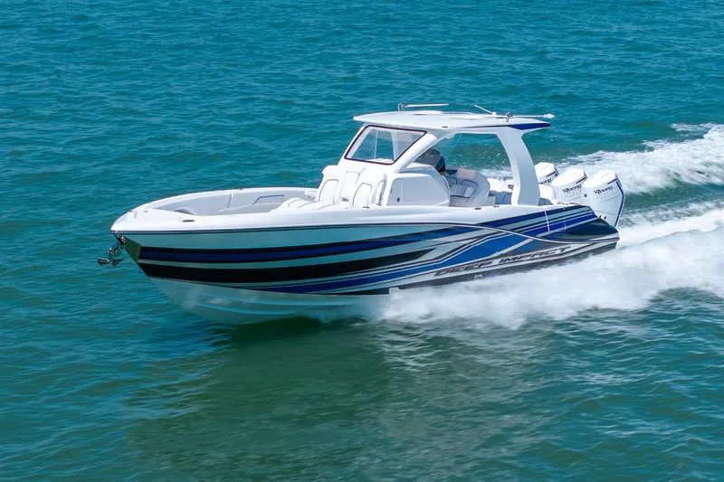 Slide: The Image of 2026 Deep Impact 369 Sport boat cruising on water. - 37