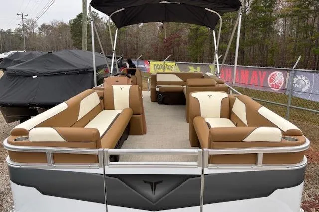 Slide: The Image of 2026 Tahoe Pontoon SP 2180 CRB with tan seating and canopy, docked outdoors. - 6