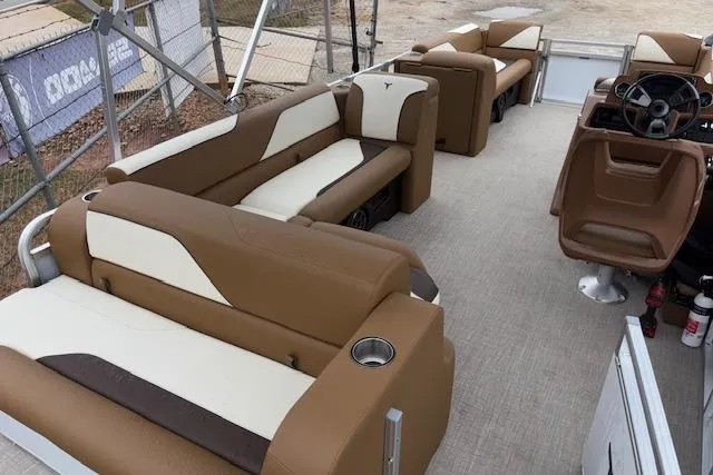 Slide: The Image of 2026 Tahoe Pontoon SP 2180 CRB with brown and white seating, spacious interior. - 8