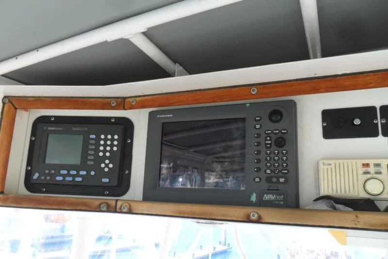 Slide: The Image of 1979 Bertram 46.6 Sport Fisher navigation equipment with radar and communication systems. - 16