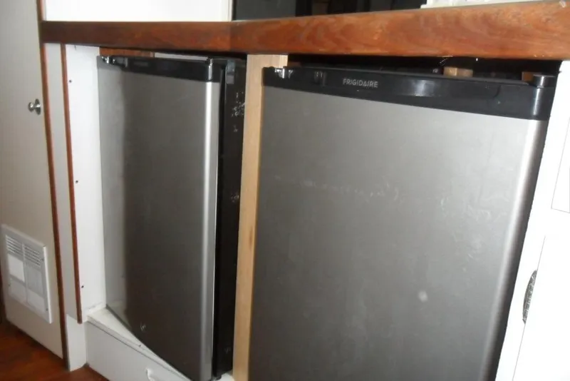 Slide: The Image of Frigidaire refrigerators in 1979 Bertram 46.6 Sport Fisher yacht kitchen. - 27