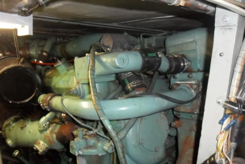 Slide: The Image of Engine compartment of a 1979 Bertram 46.6 Sport Fisher boat. - 36