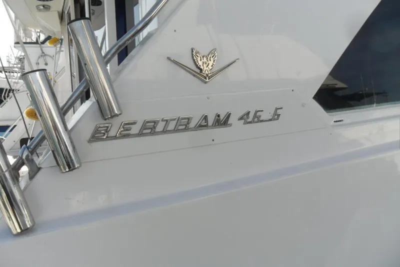 Slide: The Image of 1979 Bertram 46.6 Sport Fisher yacht with chrome lettering and emblem. - 7