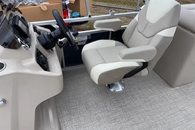 Slide: The Image of 2026 Tahoe Pontoon SPORT 2385 QUAD LOUNGE captain's chair and helm, featuring modern design. - 6