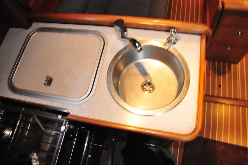 Slide: The Image of Galley area of a 2001 Bavaria 34 yacht with sink. - 16