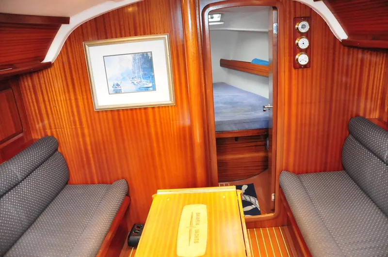 Slide: The Image of Interior of a 2001 Bavaria 34 yacht with wooden finish. - 22