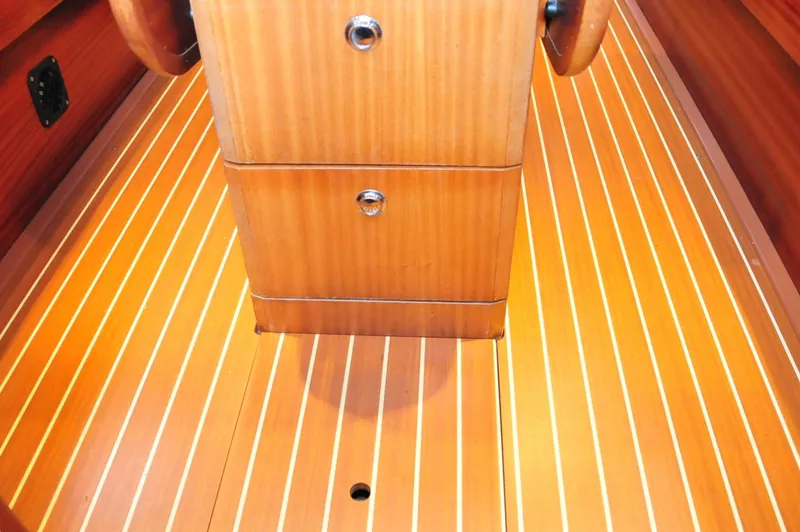 Slide: The Image of Interior of a 2001 Bavaria 34 sailboat with wooden flooring. - 31