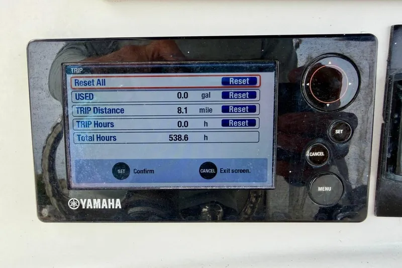 Slide: The Image of Yamaha display showing trip data on 2016 NauticStar 28 XS boat. - 23