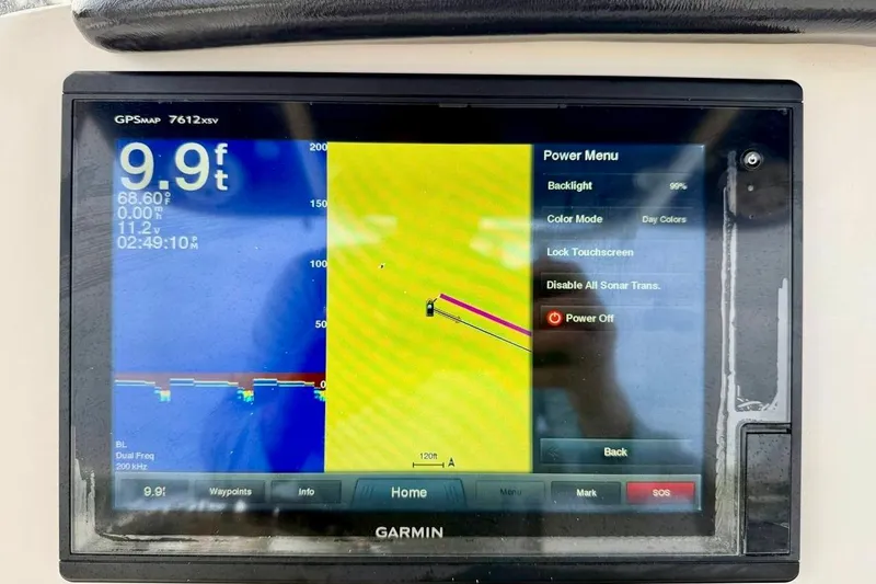 Slide: The Image of Garmin GPSMAP 7612xsv display on 2016 NauticStar 28 XS boat, showing depth and settings. - 24