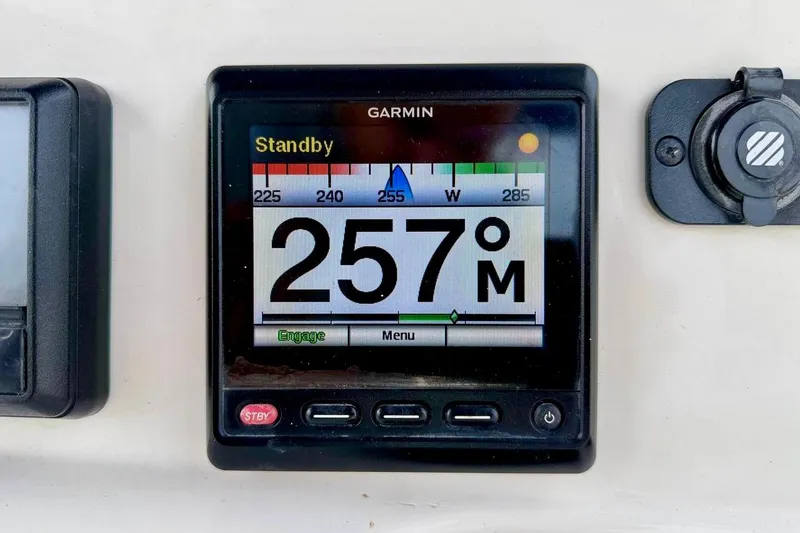 Slide: The Image of Garmin marine display on 2016 NauticStar 28 XS showing 257° heading. - 25