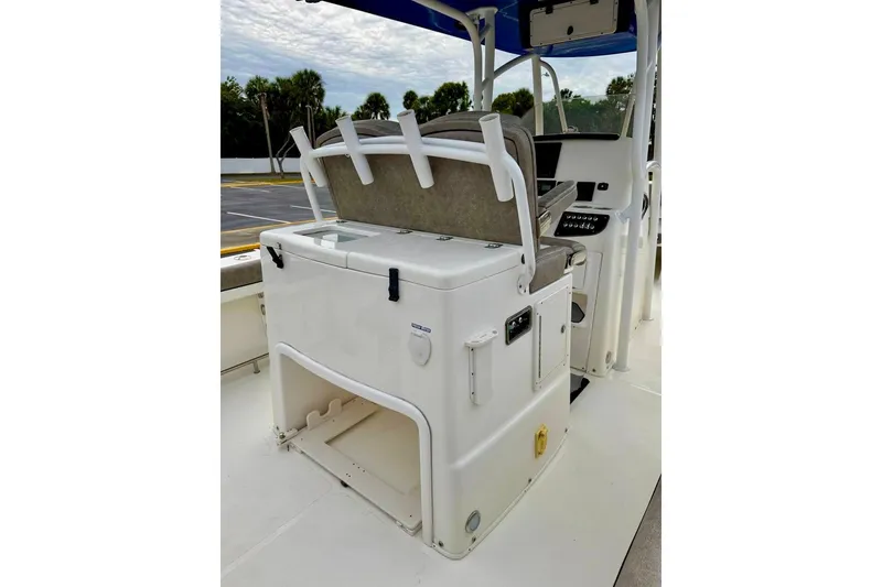 Slide: The Image of 2016 NauticStar 28 XS boat interior with seating and storage compartments. - 30