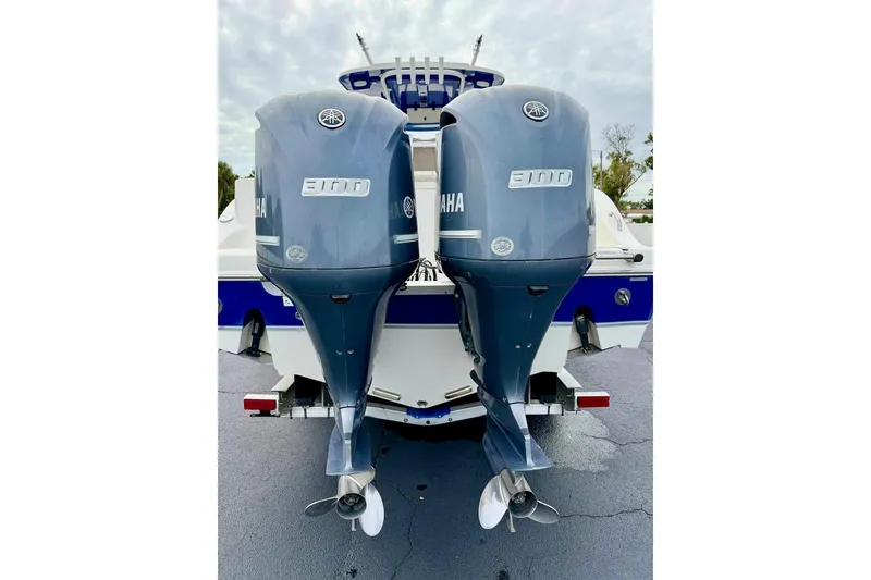 Slide: The Image of 2016 NauticStar 28 XS boat with dual Yamaha 300 outboard engines. - 42