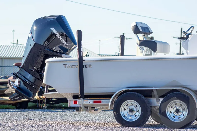 Slide: The Image of 2026 Tidewater 2110 Bay Max boat with Mercury engine on trailer. - 10