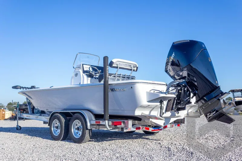 Slide: The Image of 2026 Tidewater 2110 Bay Max boat on trailer with powerful outboard motor. - 22