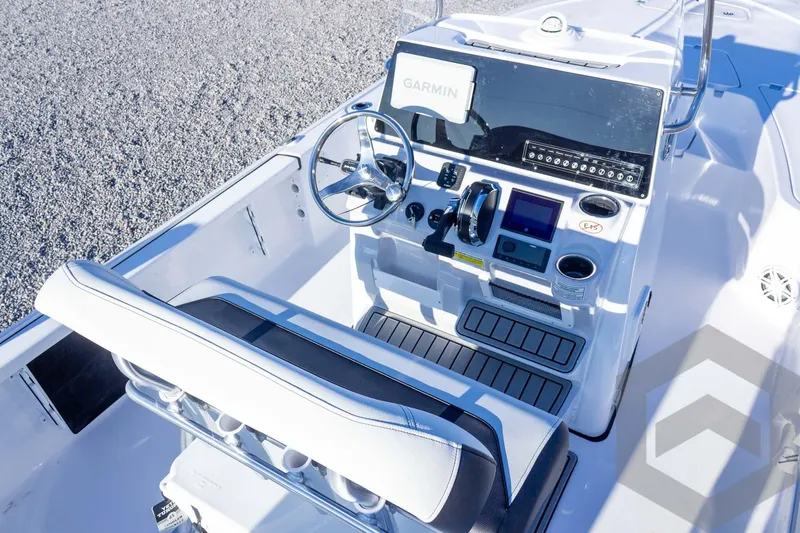 Slide: The Image of 2026 Tidewater 2110 Bay Max boat interior with Garmin navigation system and sleek design. - 31