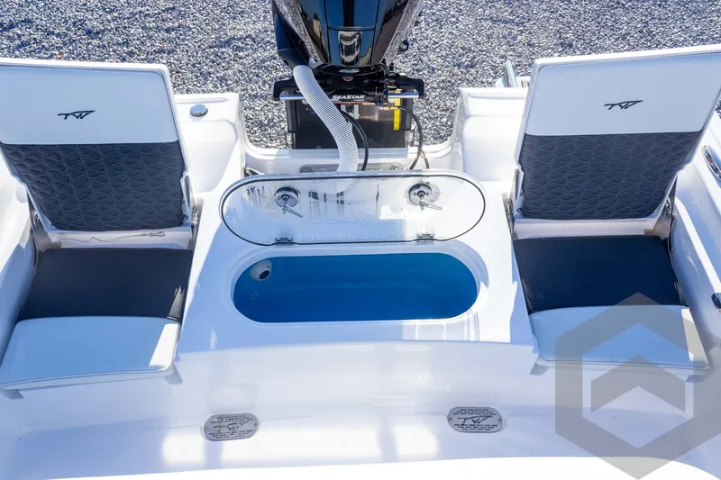 Slide: The Image of 2026 Tidewater 2110 Bay Max boat interior with seating and livewell. - 40