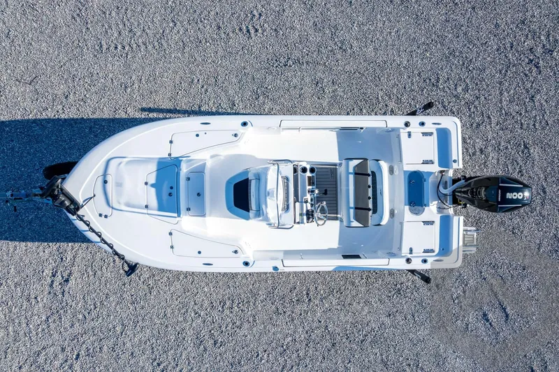 Slide: The Image of Overhead view of 2026 Tidewater 2110 Bay Max boat on gravel surface. - 44
