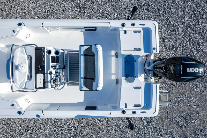 Slide: The Image of Overhead view of 2026 Tidewater 2110 Bay Max boat on gravel surface. - 46