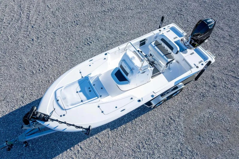 Slide: The Image of 2026 Tidewater 2110 Bay Max boat on gravel, aerial view. - 47