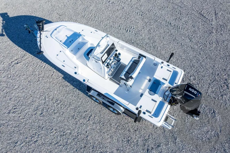 Slide: The Image of 2026 Tidewater 2110 Bay Max boat on gravel, aerial view. - 49