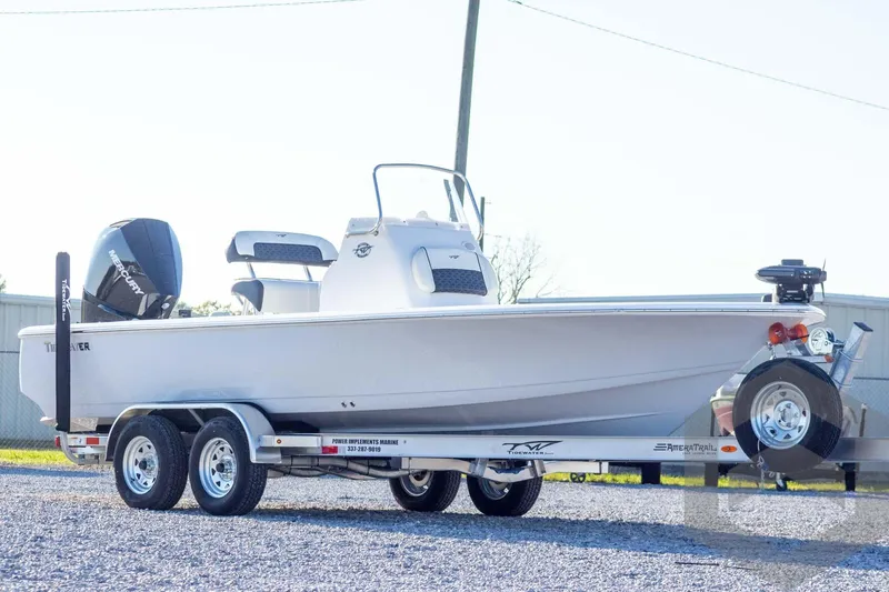 Slide: The Image of 2026 Tidewater 2110 Bay Max boat on trailer, side view in outdoor setting. - 5