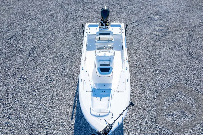 Slide: The Image of 2026 Tidewater 2110 Bay Max boat on gravel surface, aerial view. - 54