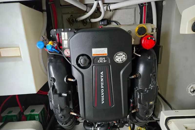 Slide: The Image of Engine compartment of a 2020 Cobalt R7 Surf boat featuring a Volvo Penta V8 engine. - 13