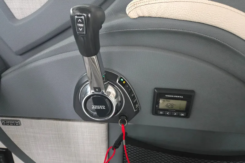 Slide: The Image of Control panel of 2020 Cobalt R7 Surf boat featuring Volvo Penta throttle and display. - 18