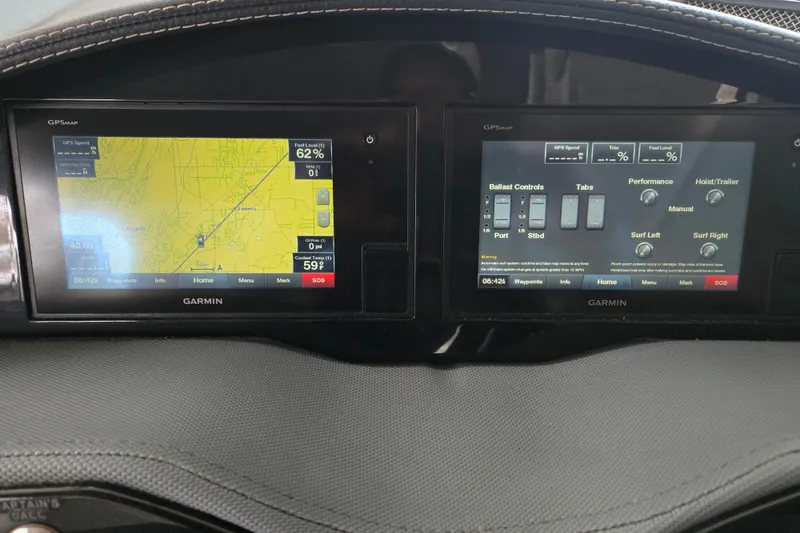 Slide: The Image of Dashboard of 2020 Cobalt R7 Surf boat with dual Garmin displays. - 21
