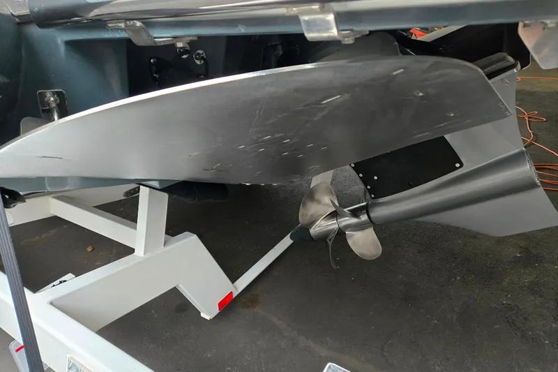 Slide: The Image of 2020 Cobalt R7 Surf boat propeller and rudder on a trailer. - 3