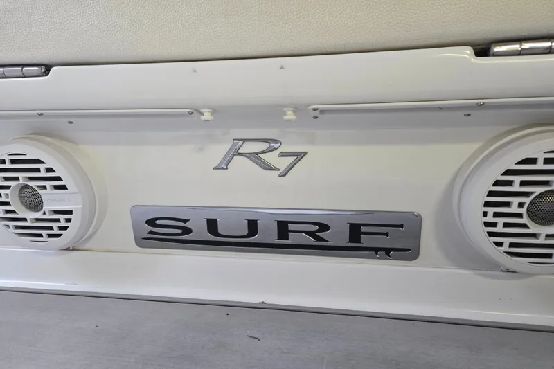 Slide: The Image of 2020 Cobalt R7 Surf boat with speakers and model branding. - 5