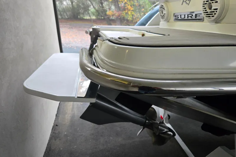 Slide: The Image of 2020 Cobalt R7 Surf boat stern with swim platform and propeller detail. - 6