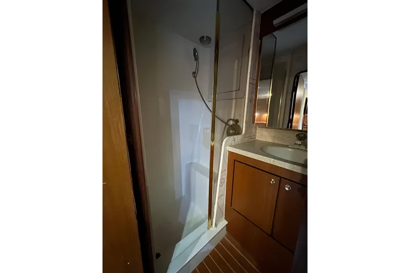 Slide: The Image of Bathroom interior of 1999 Ocean Yachts 56 Super Sport with shower and vanity. - 28