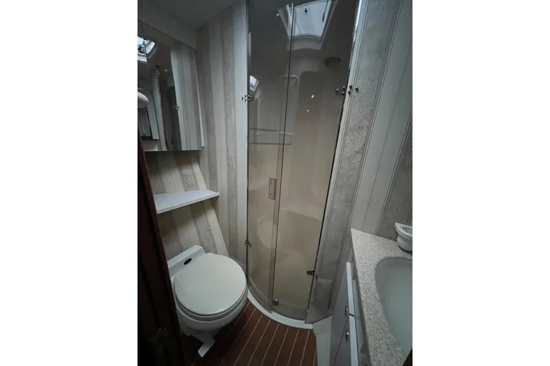Slide: The Image of Bathroom interior of 1999 Ocean Yachts 56 Super Sport with shower and toilet. - 37