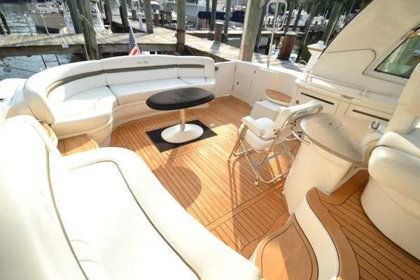 Slide: The Image of Luxurious 2007 Sea Ray Sundancer 520 yacht with spacious teak deck and elegant seating area. - 13