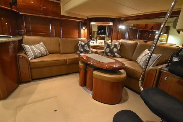 Slide: The Image of Luxurious interior of 2007 Sea Ray Sundancer 520 yacht with plush seating and elegant decor. - 14