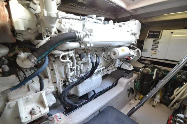 Slide: The Image of Engine room of 2007 Sea Ray Sundancer 520 yacht, showcasing machinery and components. - 28