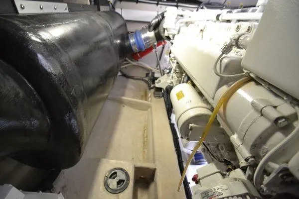 Slide: The Image of Engine room of 2007 Sea Ray Sundancer 520 yacht, showcasing mechanical components. - 30