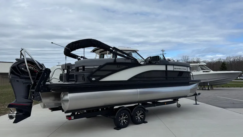 Slide: The Image of Bennington 22MOFB-SPS (TC) 2026 pontoon boat on trailer, side view. - 20